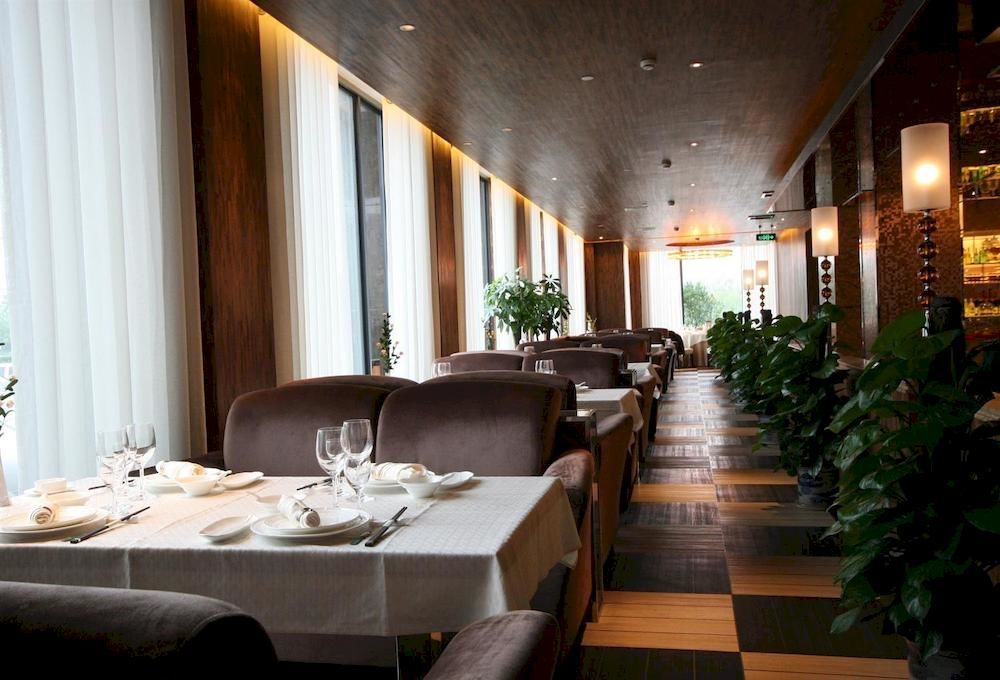 Four Seasons Rayli Hotel Нінбо Екстер'єр фото