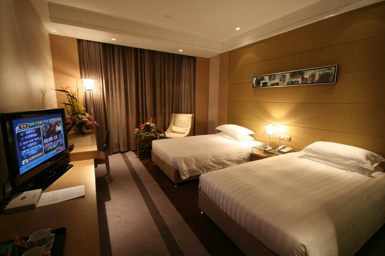 Four Seasons Rayli Hotel Нінбо Екстер'єр фото